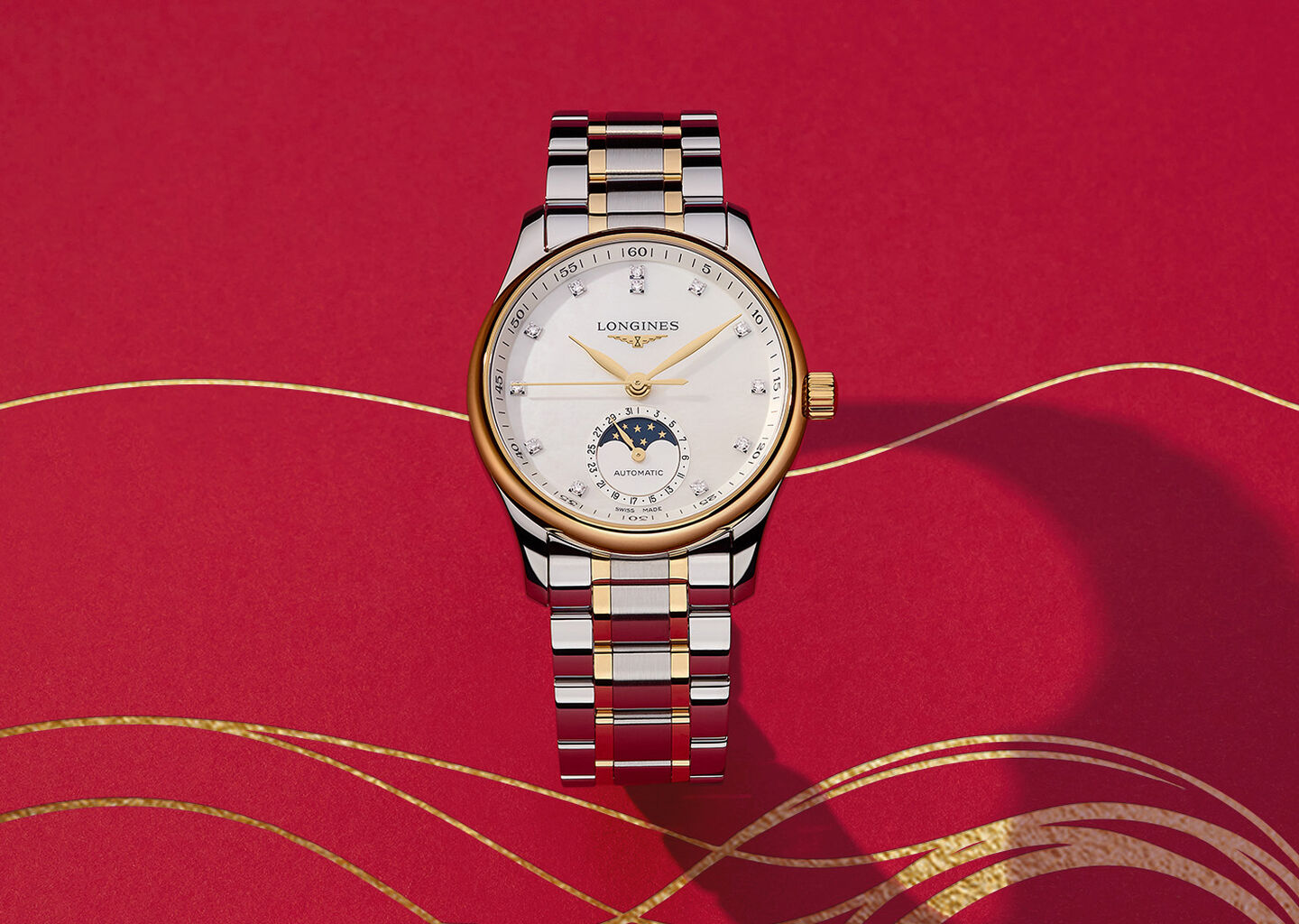 Longines watch on a red background,